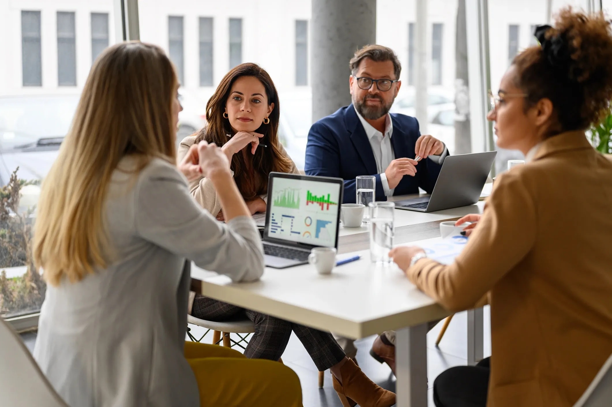 Financial advisor meeting with clients to discuss approach